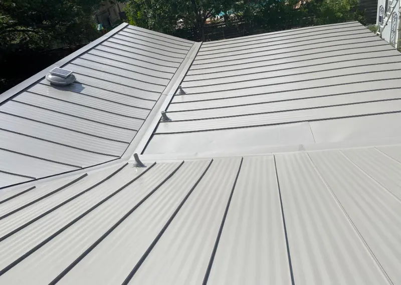 Solar attic fan installed on a metal roof for Roof Ventilation in South Euclid