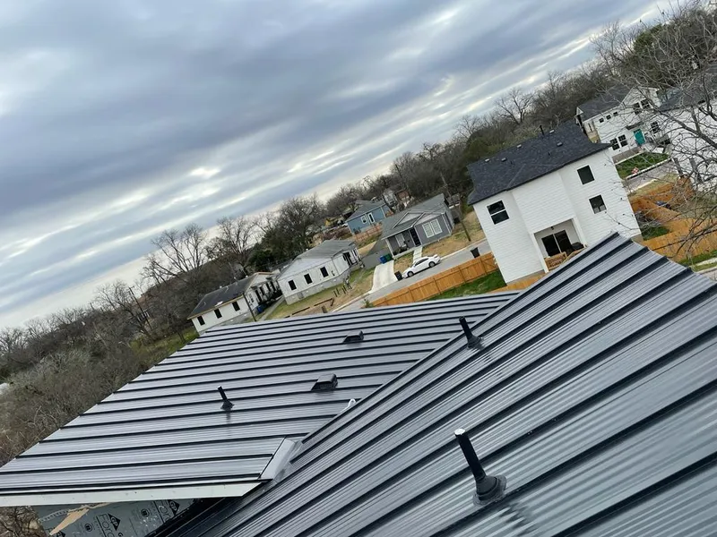 Standing seam metal roof panels with vents for Skylight Repair in South Euclid